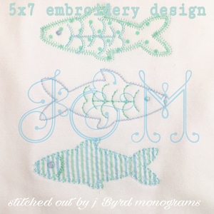 May include: 5x7 embroidery design featuring three blue and green fish. The fish are stitched in a variety of patterns, including stripes, dots, and swirls. The text "stitched out by j Byrd monograms" is also included in the design.