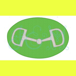 May include: A green oval-shaped patch with a white metal snaffle bit design in the center.