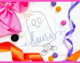 May include: Embroidered design of a ghost wearing a bow and shoes with the name "Laura" stitched below. The design is on a white fabric background with colorful ribbons and pom-poms around it.