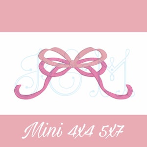 May include: Pink satin bow with a double loop and tails. The bow is on a white background with the text "Mini 4x4 5x7" below it.