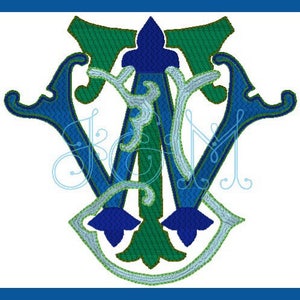 May include: A monogram design featuring the letters W, A, and M in a stylized, ornate font. The design incorporates shades of blue and green, with decorative flourishes and a light blue outline. The overall style is elegant and classic.
