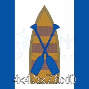 May include: A brown and yellow canoe with two blue oars crossed inside. The canoe is 4x4, 5x7, and 6x10 inches.