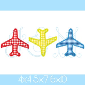 May include: Three embroidered airplane designs in red, yellow, and blue with a white gingham pattern. The airplanes are arranged horizontally.