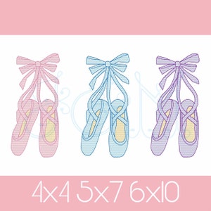 May include: Three pairs of ballet shoes with ribbons, each in a different color: pink, blue, and purple. The shoes are tied together with the ribbons and are hanging down.