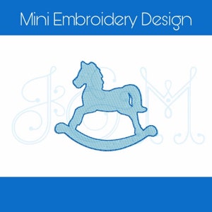 May include: A light blue embroidered rocking horse design. The image includes the text "Mini Embroidery Design" at the top. Decorative script letters are on the left and right sides of the rocking horse.