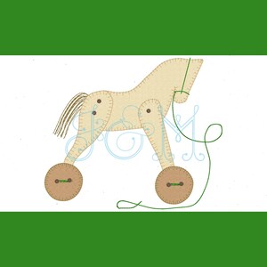 May include: A beige rocking horse toy with brown yarn hair, brown button eyes, and green yarn reins. The horse has brown wheels with green button accents.