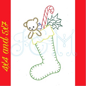 May include: A green Christmas stocking with a teddy bear, candy cane, and holly inside. The stocking is filled with a teddy bear, candy cane, and holly.