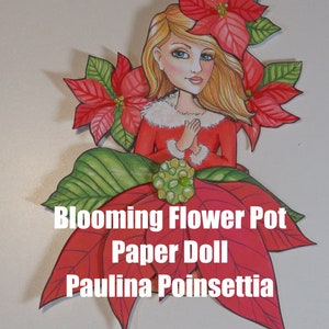 Op de afbeelding: Een papieren pop van een meisje met blond haar en een rode jurk, omringd door rode kerststerren. De tekst "Blooming Flower Pot Paper Doll Paulina Poinsettia" staat onder de pop.