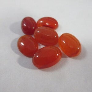 1PC 10X14MM NATURAL CARNELIAN oval cabochon orange carnelian cabochon oval 10x14mm aaa quality smooth caochon 10x14mm carnelian cabochon image 2