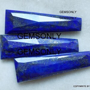 May include: Three faceted lapis lazuli gemstone cabochons in various sizes. The stones are a deep blue color with flecks of gold pyrite.