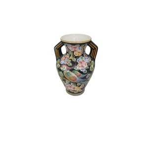 May include: A black ceramic vase with two handles, adorned with colorful floral and bird designs. The vase features a white interior and gold accents on the rim and handles. A decorative piece for home decor.