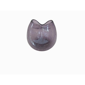 May include: A small, rounded, purple glass vase with a unique, curved opening. The vase has a textured surface and a dark purple hue, suitable for displaying small flowers or decorative items.