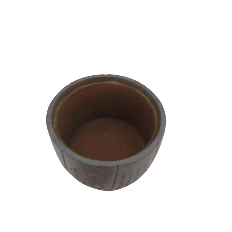 May include: A brown, cylindrical container with a gray rim. The interior is a lighter brown. The container has text on the side, partially visible. The object is set against a white background.