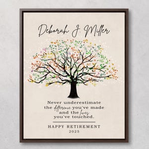 May include: Framed art print featuring a tree illustration with colorful leaves. The print includes the name "Deborah J. Miller" and the text "Never underestimate the difference you've made and the lives you've touched. Happy Retirement 2025."