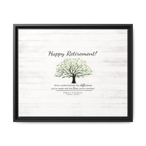 May include: A framed print with the words "Happy Retirement!" above a tree illustration. The tree has green leaves and a black trunk. Below the tree is the text "Never underestimate the difference you've made and the lives you've touched."