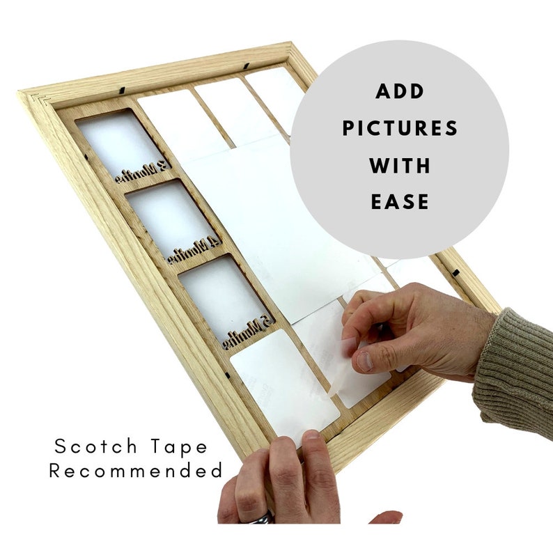 May include: A wooden picture frame with nine openings for photos. The frame is made of natural wood and has a rustic look. The frame is designed to be used with scotch tape to hold the photos in place. The text "Add Pictures With Ease" is written on a white circle in the upper right corner of the image. The text "Scotch Tape Recommended" is written below the frame.