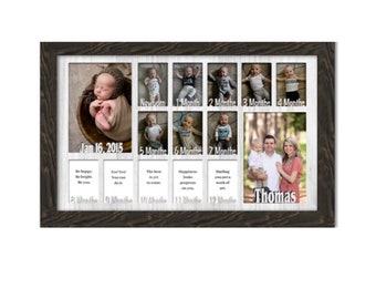 May include: A white wooden picture frame with a black border, containing 12 photos of a baby boy at different ages. The frame has a white background with black text that says "Jan 16, 2015" and "Thomas".