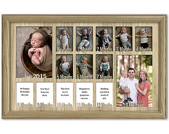 May include: A wooden photo frame with 12 openings for pictures, showcasing a baby's first year. The frame has a light wood finish and includes the text "Jan 2015" and "Thomas".