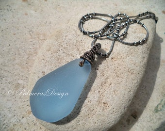 ISY BLUE wire wrapped in sterling silver seaglass pendant.