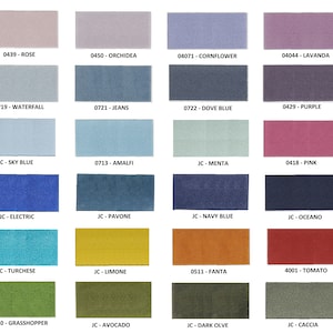 May include: A color chart featuring twenty-four rectangular fabric swatches arranged in a grid. Each swatch is labeled with a unique code and color name, including Rose, Orchidea, Cornflower, Lavanda, Waterfall, Jeans, Dove Blue, Purple, Sky Blue, Amalfi, Menta, Pink, Electric, Pavone, Navy Blue, Oceano, Turchese, Limone, Fanta, Tomato, Grasshopper, Avocado, Dark Olive, and Caccia.