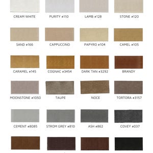 May include: A color chart featuring twenty-four rectangular swatches arranged in six rows of four. Each swatch displays a unique shade ranging from cream white to black, with corresponding labels such as Cream White, Purity #110, Lamb #128, Stone #120, Sand #166, Cappuccino, Papyro #104, Camel #105, Caramel #145, Cognac #3454, Dark Tan #3292, Brandy, Moonstone #1050, Taupe, Noce, Tortora #3157, Cement #8085, Strom Grey #810, Ash #862, Covey #037, Nut, Caff&egrave;, Choco #349, and Black.