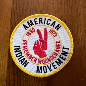 New 1973 American Indian Movement - Remember wounded knee 1890 - 1973 embroidered patch design.