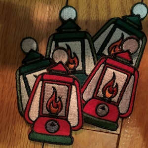 Ole Camping Lantern embroidered patches - 2 types Red & Green styles.