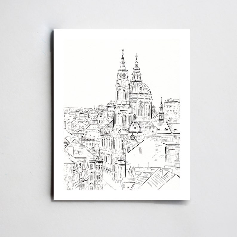 May include: A black and white line drawing of a cityscape with a prominent church in the center. The church has two towers and a dome. The drawing is done in a simple style, with a focus on the architecture of the buildings.