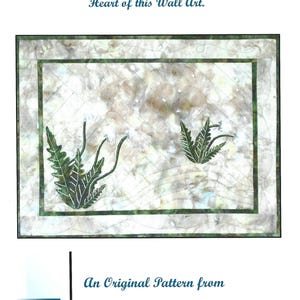 May include: A quilt pattern design featuring a white background with green dandelion silhouettes and the text "Gone With the Wind!" Wind Blown, Dancing Dandelions are the Heart of this Wall Art. An Original Pattern from EB Designs by Eileen.
