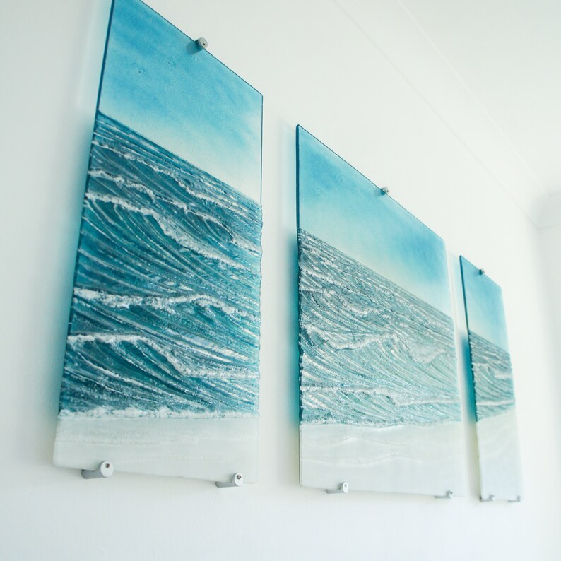 extra large wall art
teal fused glass
triptych wall art
textured wall art
gallery wall
3 piece wall art
set of 3 prints
wall art set
living room decor
sculpture sea glass
wall hanging
glass wall panels
blue wall sculpture