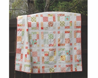 May include: A quilt pattern called "Charming" by Meadow Mist Designs. The pattern is for a charm pack and layer cake and includes baby, lap, and king sizes.