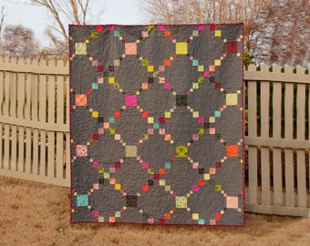 Irish Puzzle, digital quilt pattern in baby, lap, twin sizes.  Charm pack and scrap friendly design.