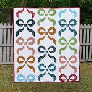 Festive Bows Digital pdf Quilt Pattern - Charm Pack and Fat Quarter Quilt Pattern, Throw Size Quilt, Holiday and Christmas Quilt Pattern