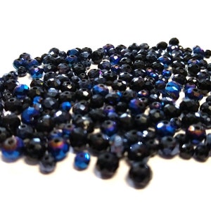 Faceted Glass Rondelle Beads: Blues and Blacks AB Coating
