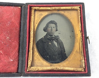 Antique Photo of a Man with Bow tie, Ambrotype in Union Case, 9th plate.