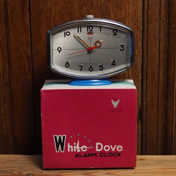 1970's One Vintage China White Dove Alarm clock in original box never been used