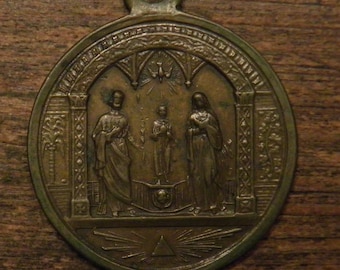 Antique religious bronze medal pendant of the holy family St.Joseph Jesus Holy Mary