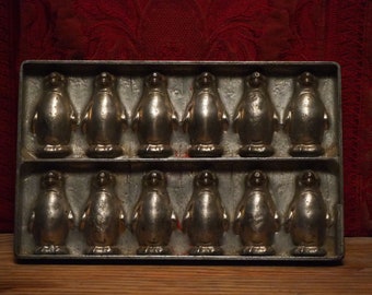Antieke platvorm chocoladevorm van 12 x kleine pinguïn van Anton Reiche Dresden (C)