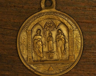 Antique religious bronze medal pendant of the holy family St.Joseph Jesus Holy Mary