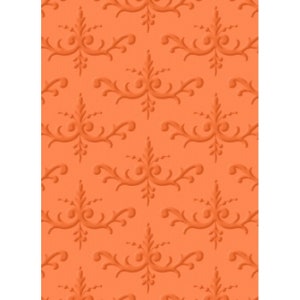 Op de afbeelding: Een set van drie keramische mokken met een gespikkelde, matte afwerking. De mokken zijn in de kleuren crème, lichtgrijs en donkergrijs. Elke mok heeft een eenvoudig, minimalistisch ontwerp en een afgeronde handgreep.