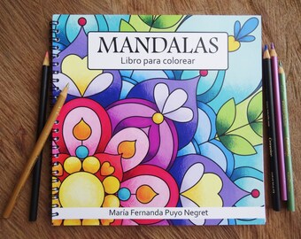 May include: A colorful mandala coloring book with the title "MANDALAS Libro para colorear" and the author's name "Maria Fernanda Puyo Negrel" on the cover.