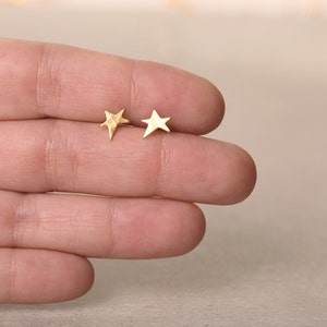 golden star earrings, studs, star posts, a symmetrical star earrings, tiny studs, gift for girl, holiday shopping, stack earrings, shine