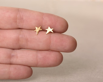 golden star earrings, studs, star posts, a symmetrical star earrings, tiny studs, gift for girl, holiday shopping, stack earrings, shine