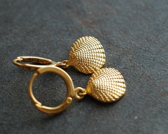 By the sea . gold plated earrings with shells . mother's day jewelry .  gifts for her