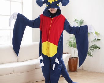 May include: A blue and red hooded jumpsuit with a yellow accent. The jumpsuit features a dragon design with large wings and a tail.