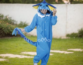 May include: A blue and yellow Pokemon onesie with a hood shaped like a Vaporeon. The onesie has a zipper down the front and a tail.