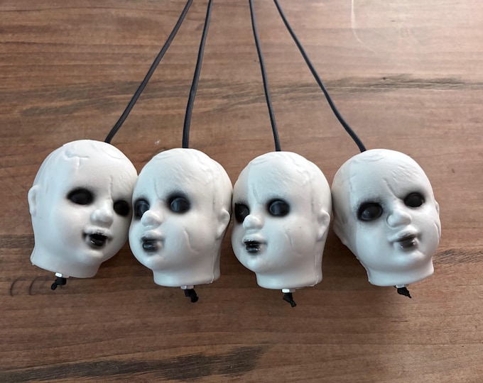 Creepy Doll Head Flogger