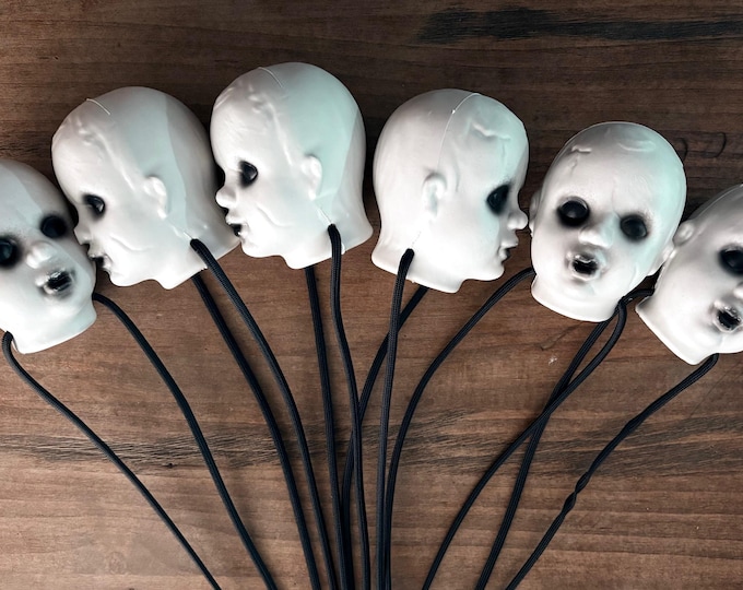 Creepy Doll Head Flogger