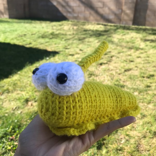 Crocheted banana slug