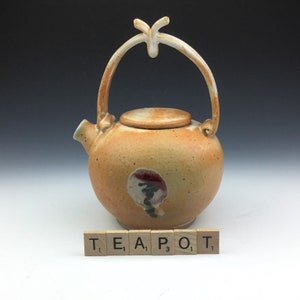 Ceramic pottery handmade kettle pot jug teapot in orange and white holds 24 fluid ounces
